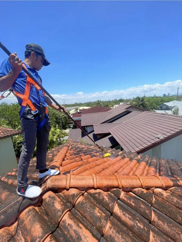 TopMop crew working on the clay tile roof in Quezon City